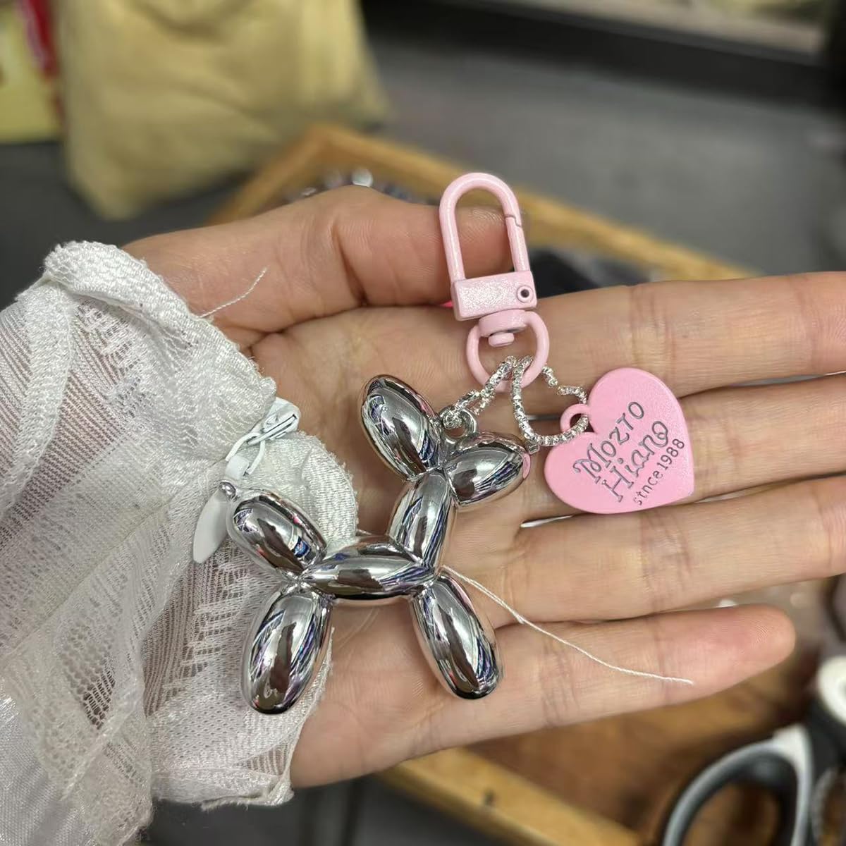 S.A.V.I Balloon Dog Keychain for Women & Girls, Cute Bag Charm, Silver Pink, Glossy metal accessory with clip for handbags, backpacks & keys; stylish gift for everyday fashion lovers.